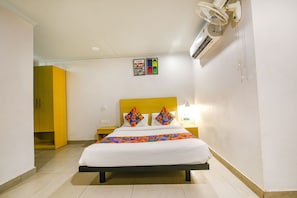 Premium Room | Egyptian cotton sheets, premium bedding, in-room safe, free WiFi - Fabhotel One (Ghaziabad)