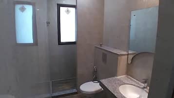 Shower, rainfall showerhead, towels