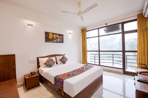 Deluxe Room | Egyptian cotton sheets, premium bedding, in-room safe, free WiFi - Fabhotel Raj (Madikeri)