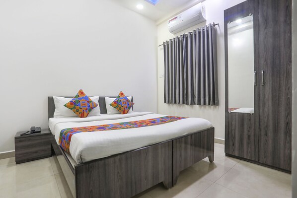 Deluxe Room | Egyptian cotton sheets, premium bedding, in-room safe, free WiFi - Fabhotel Legacy I (Nagpur)