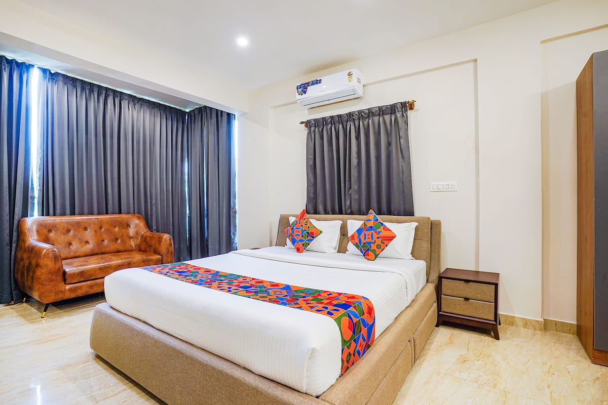Premium kamer | Lakens van Egyptisch katoen, luxe beddengoed, een kluis op de kamer