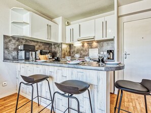 Microwave, toaster, high chair