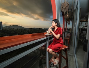 Guests can enjoy panoramic views from this outdoor seating area.