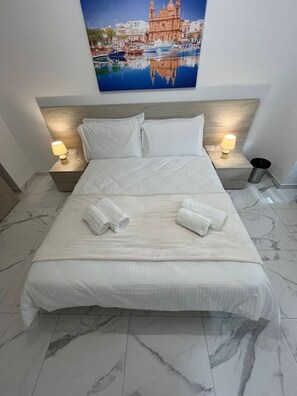 2 slaapkamers, een strijkplank/strijkijzer, wifi, beddengoed