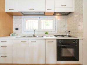 Oven, highchair, dining tables