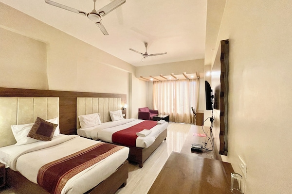 Desk, laptop workspace, free WiFi, bed sheets