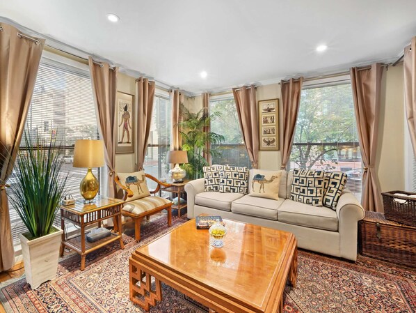 Smart TV, fireplace, books, offices