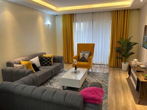 Appartement, 1 chambre | Coin séjour