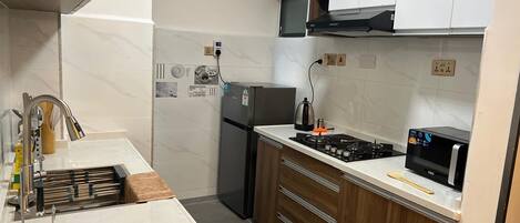 Apartment, 1 Bedroom | Private kitchen | Cookware/dishes/utensils