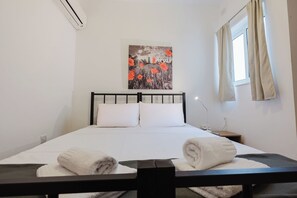1 habitación, tabla de planchar con plancha, wifi gratis y ropa de cama 