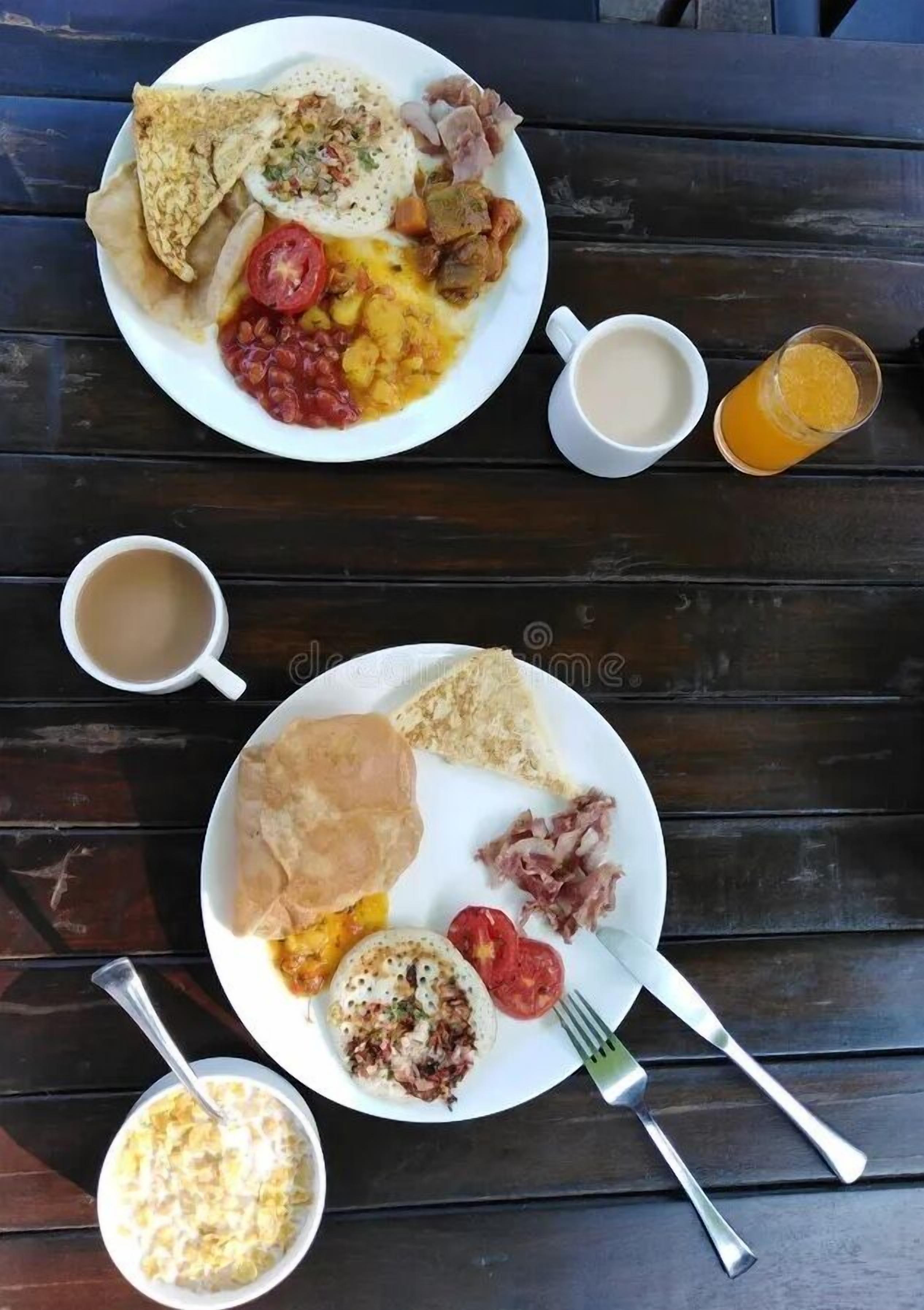 Dagelijks ontbijtbuffet (INR 500 per persoon)