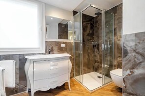 Hair dryer, bidet, towels, soap