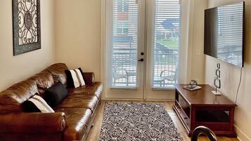 Apartment, Multiple Beds, Balcony (Harvest Gem) | Living area | 42-inch flat-screen TV with digital channels
