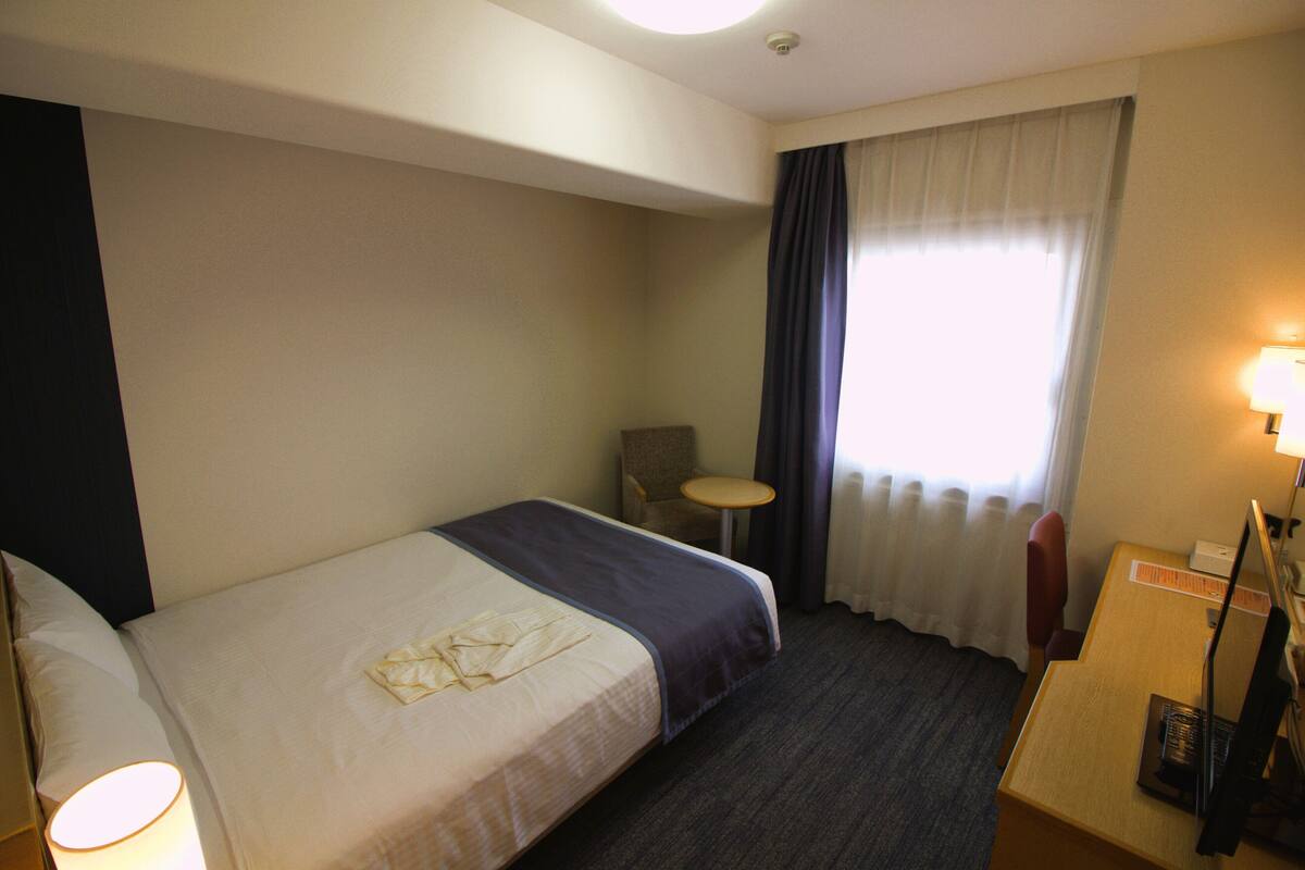 Desk, blackout curtains, iron/ironing board (on request), free WiFi