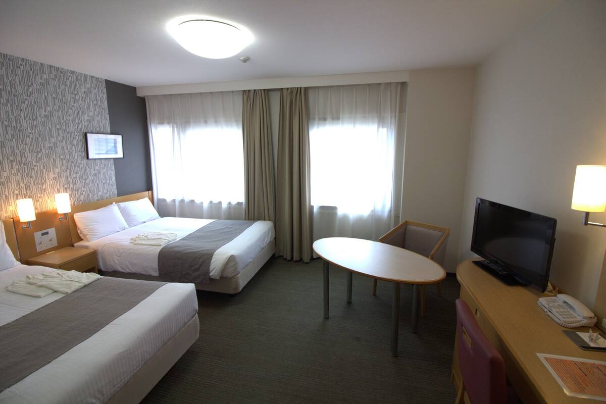 Desk, blackout curtains, iron/ironing board (on request), free WiFi