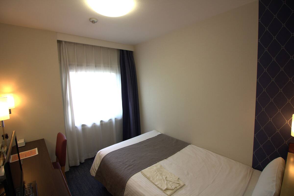Desk, blackout curtains, iron/ironing board (on request), free WiFi