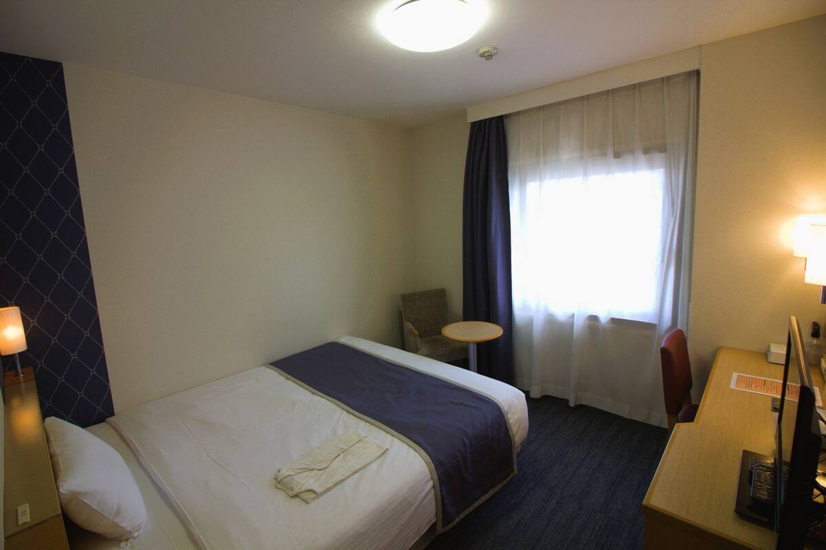 Desk, blackout curtains, iron/ironing board (on request), free WiFi