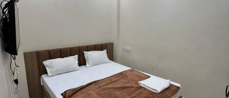 Habitació econòmica | Roba de llit d'alta qualitat i cobrellits