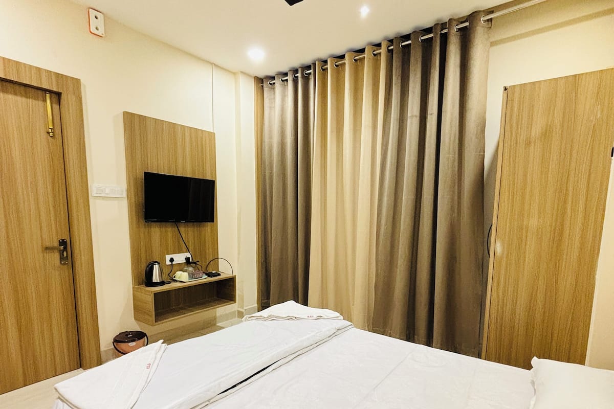Deluxe tweepersoonskamer | Luxe beddengoed, donzen dekbedden, bedden met traagschuimmatras