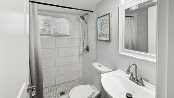 Hair dryer, towels, soap, shampoo