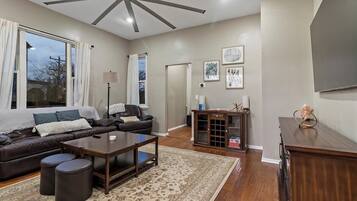 TV, fireplace, books, offices