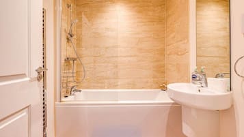 Shower, hair dryer, shampoo