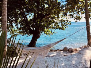 On the beach, sun loungers, beach towels