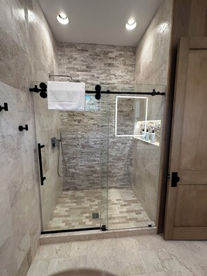 Shower, hair dryer, towels, soap