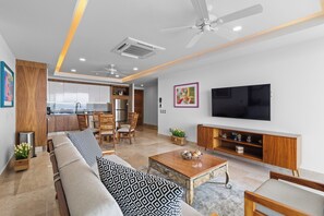 Deluxe Apartment, Balcony, Sea View | Living area