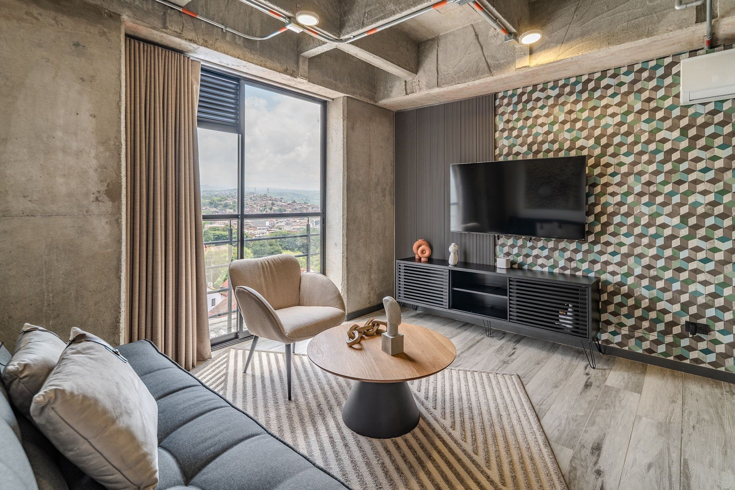 Comfort Apartment | Living area | 30-inch TV with cable channels