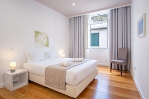 1 dormitorio, tabla de planchar con plancha, Internet y ropa de cama