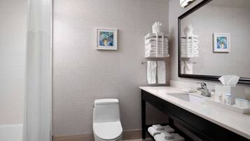 Standard Room, 2 Queen Beds, Non Smoking | Bathroom | Hair dryer, towels, soap, shampoo