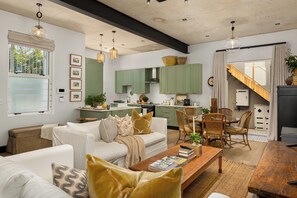 Cozy living space with a comfortable seating area, dining space, and kitchen.