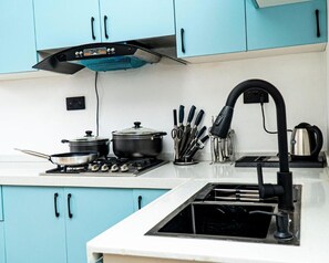 Private kitchen - The Milon Apartment One-Bedroom Apartment (Kigali)