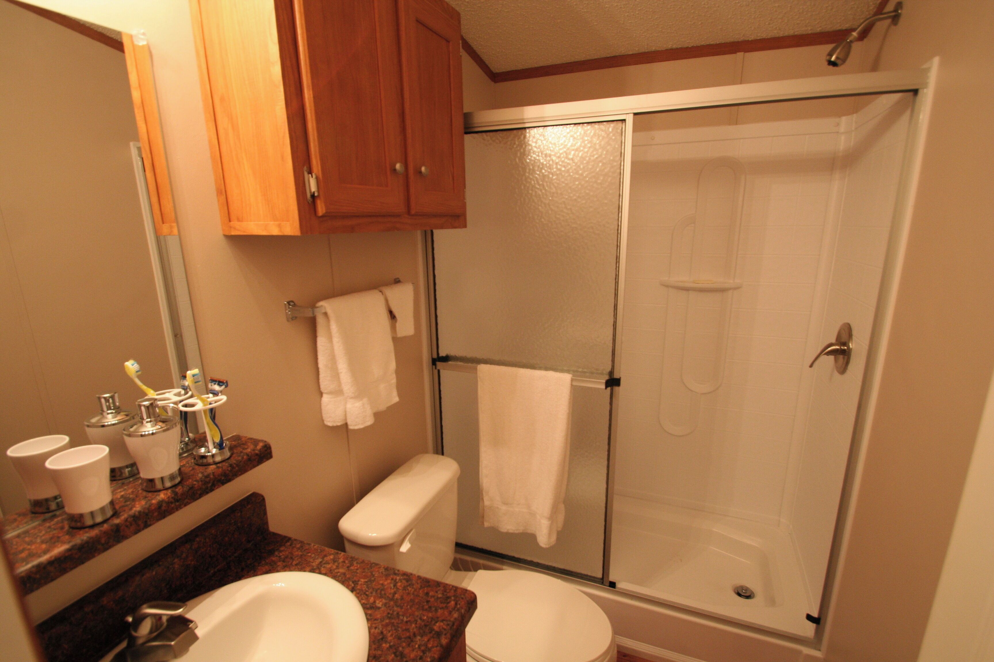 Shower, towels, soap, shampoo