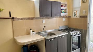 Fridge, microwave, stovetop, coffee/tea maker