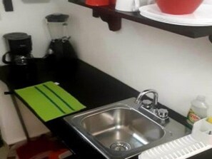 Fridge, microwave, stovetop, coffee/tea maker