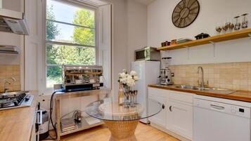 Oven, dishwasher, highchair, cookware/dishes/utensils