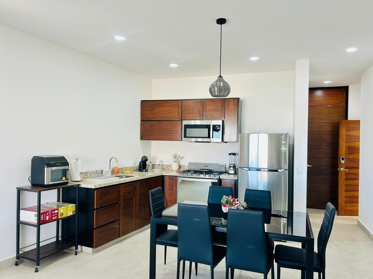 Coffee/tea maker, fridge, microwave, oven