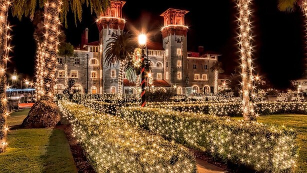 A large, illuminated building with multiple towers and a well-lit garden area. - Guesthouse w/ Balcony · Walk to Downtown · Bikes (St Augustine)
