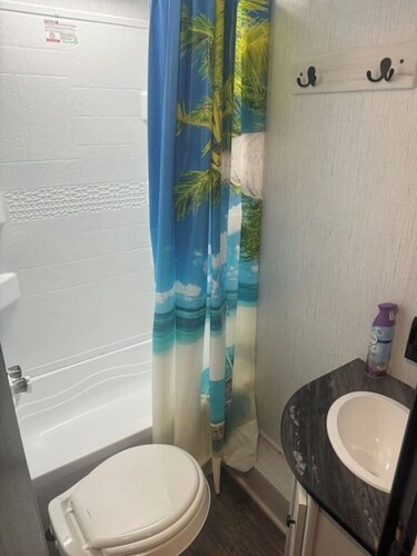 Nice RV with AC in charming Holly Beach steps from the beach