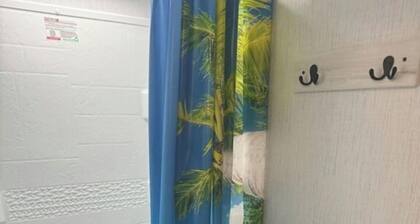 Nice RV with AC in charming Holly Beach steps from the beach