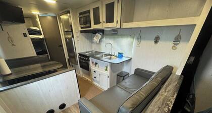 Nice RV with AC in charming Holly Beach steps from the beach
