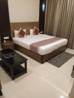 Comfort Studio, Balcony, City View | In-room safe, desk, laptop workspace, iron/ironing board