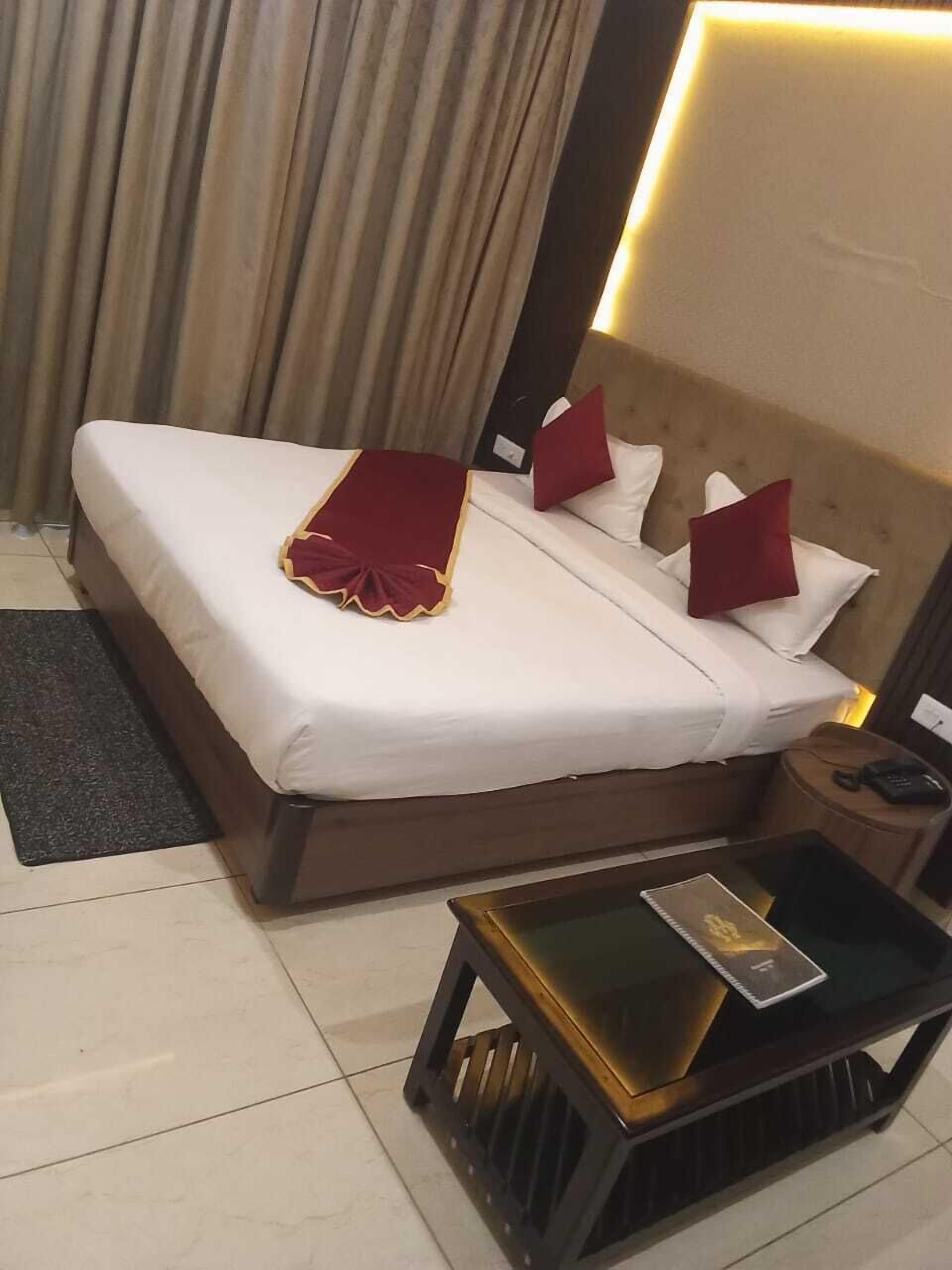 Comfort Studio, Balcony, City View | In-room safe, desk, laptop workspace, iron/ironing board