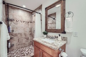 Hair dryer, towels, soap, toilet paper