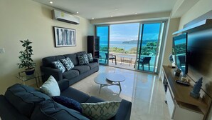 Luxury Apartment, Beach View | Living area - 06E Floor to Ceiling Oceanview Resort  (Veracruz)