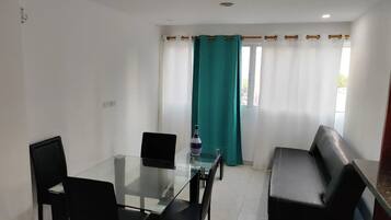 Basic Apartment | Living area | 42-inch LCD TV with cable channels