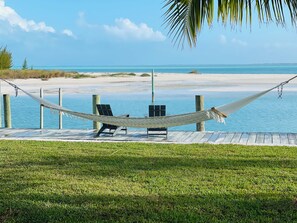 Sun-loungers, beach towels - Waterfront 5BR Oasis - 50’ Private Dock - 6-Seater Golf Cart Option (Treasure Cay)