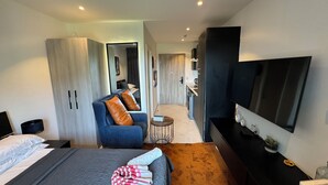 Deluxe Studio Suite, Courtyard View | Desk, laptop workspace, blackout drapes, soundproofing - The Lennox  (Accra)